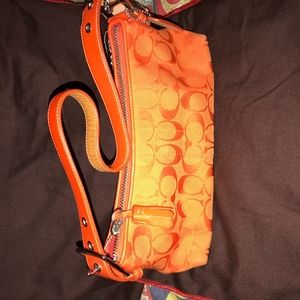 COACH Orange Clutch